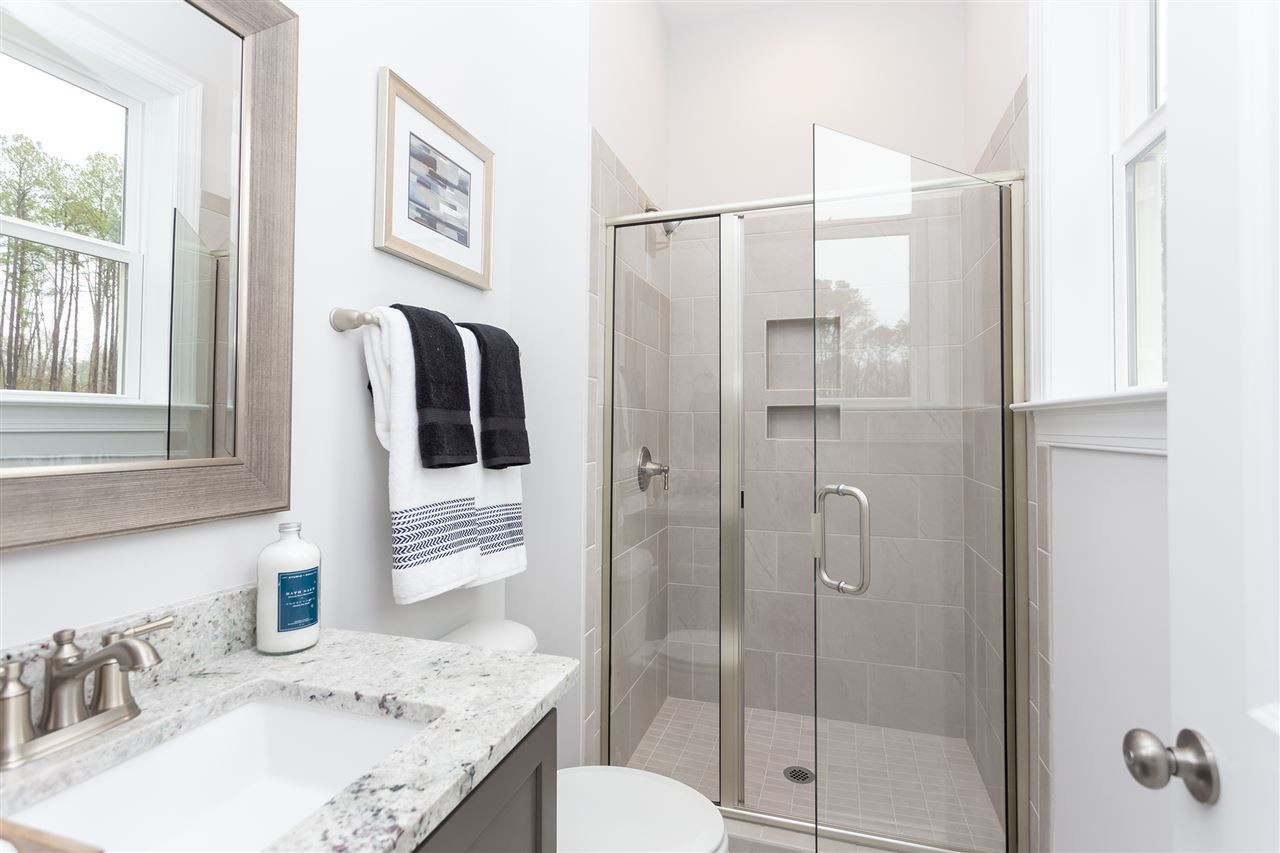 5216 Stream Bank Court, Unit 19 Raleigh, NC 27603 - Photo 14 of 30 Photo is for representational purposes only - not of actual home. Guest Bath