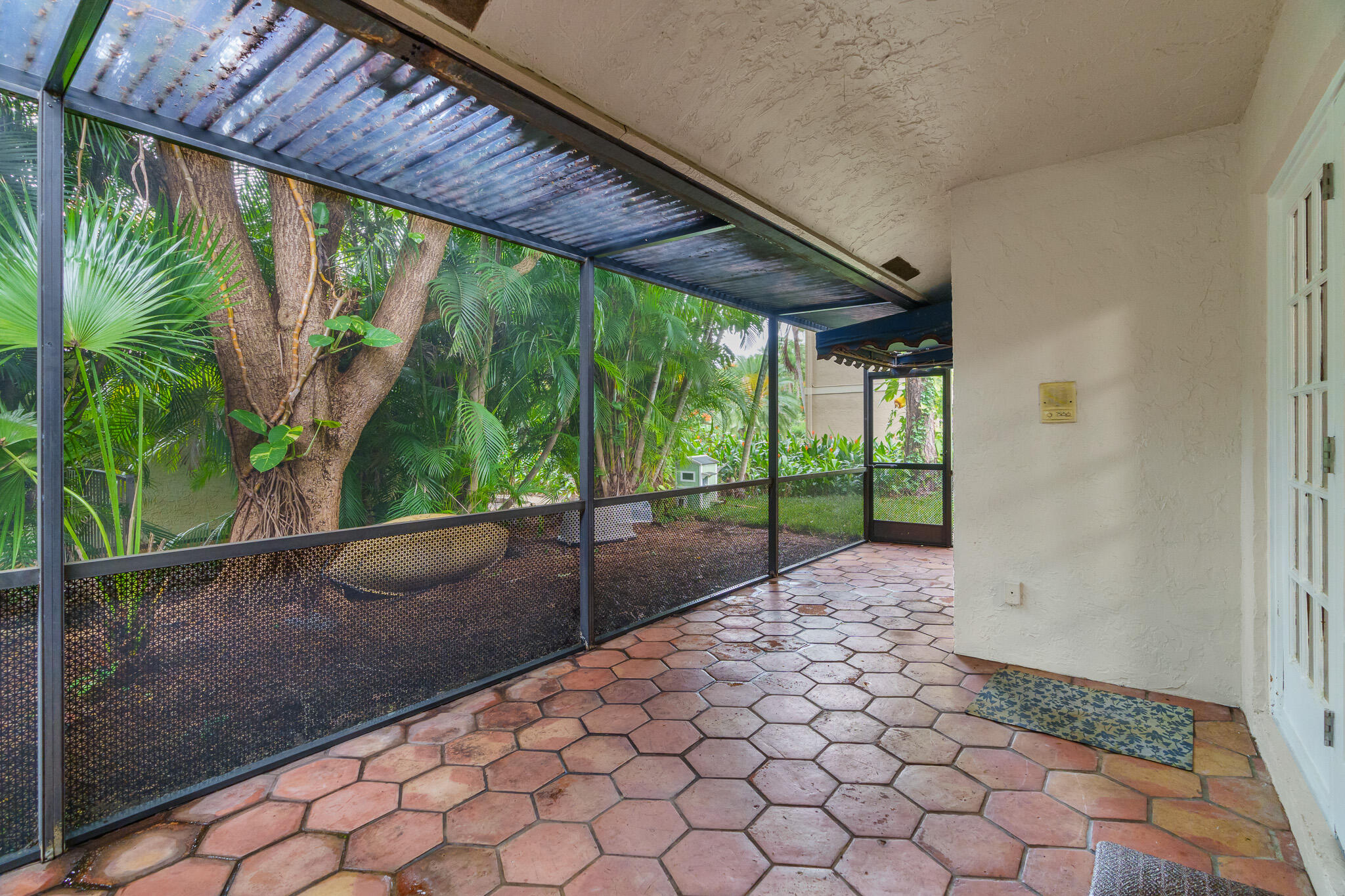 2801 Northwest 27th Avenue Boca Raton, FL 33434 - Photo 47 of 60 Screened Patio Off of Kitchen & Dining
