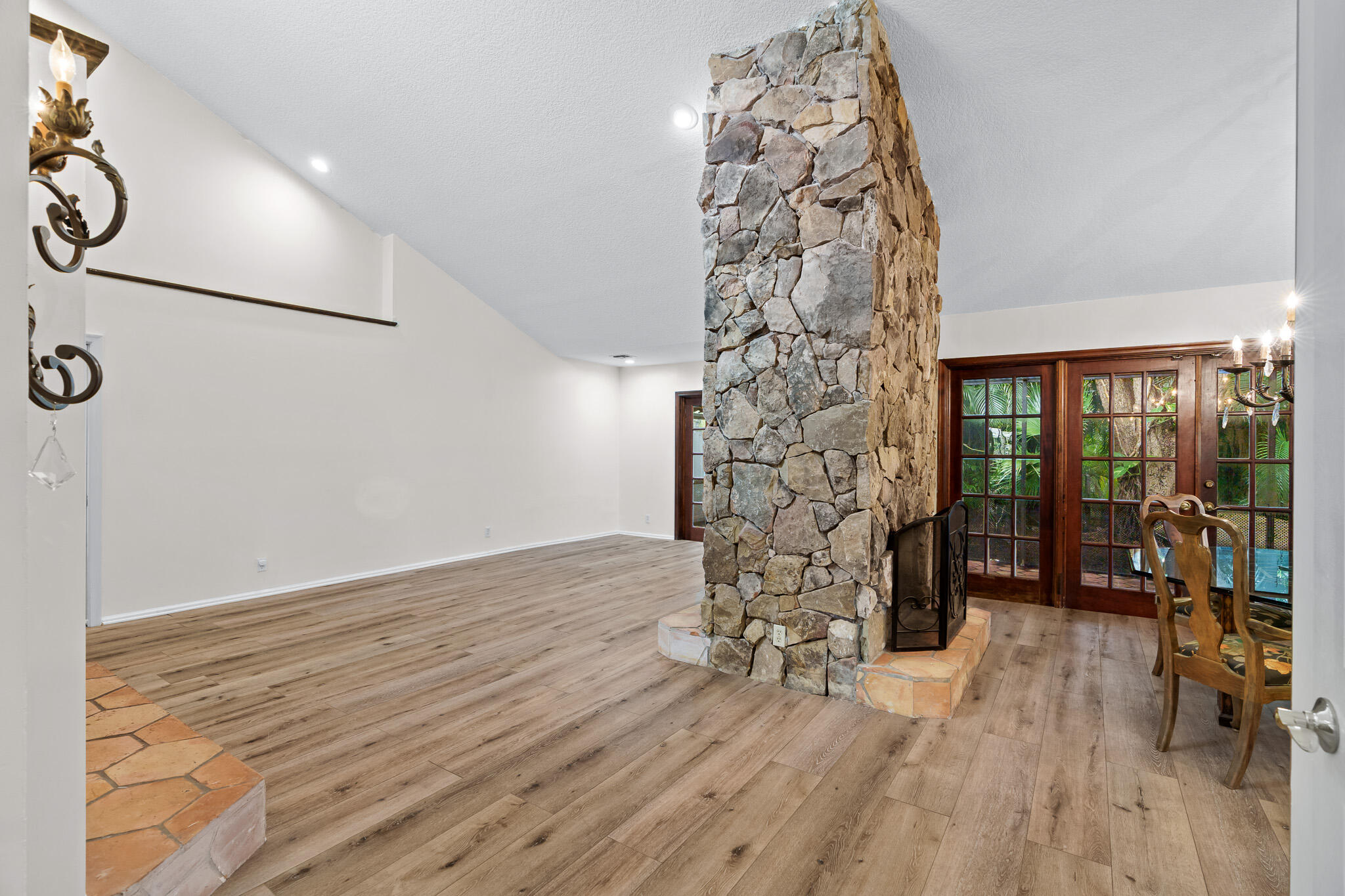 Family and Dining Room with Fireplace