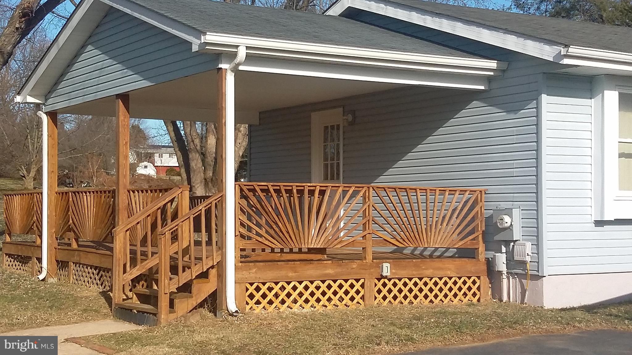 1061 Dr Jack Road Conowingo, MD 21918 - Photo 3 of 35 Nice sized aprox 14 32 deck partially covered.