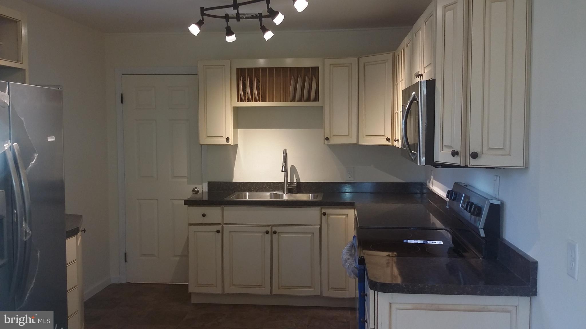 1061 Dr Jack Road Conowingo, MD 21918 - Photo 5 of 35 New kitchen with new stainless appliances