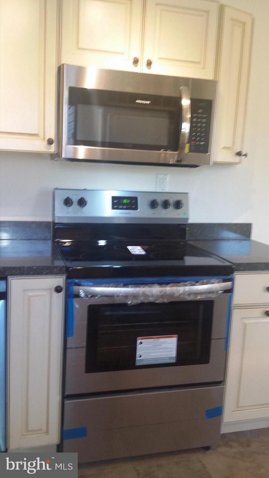 1061 Dr Jack Road Conowingo, MD 21918 - Photo 8 of 35 New microwave and range.