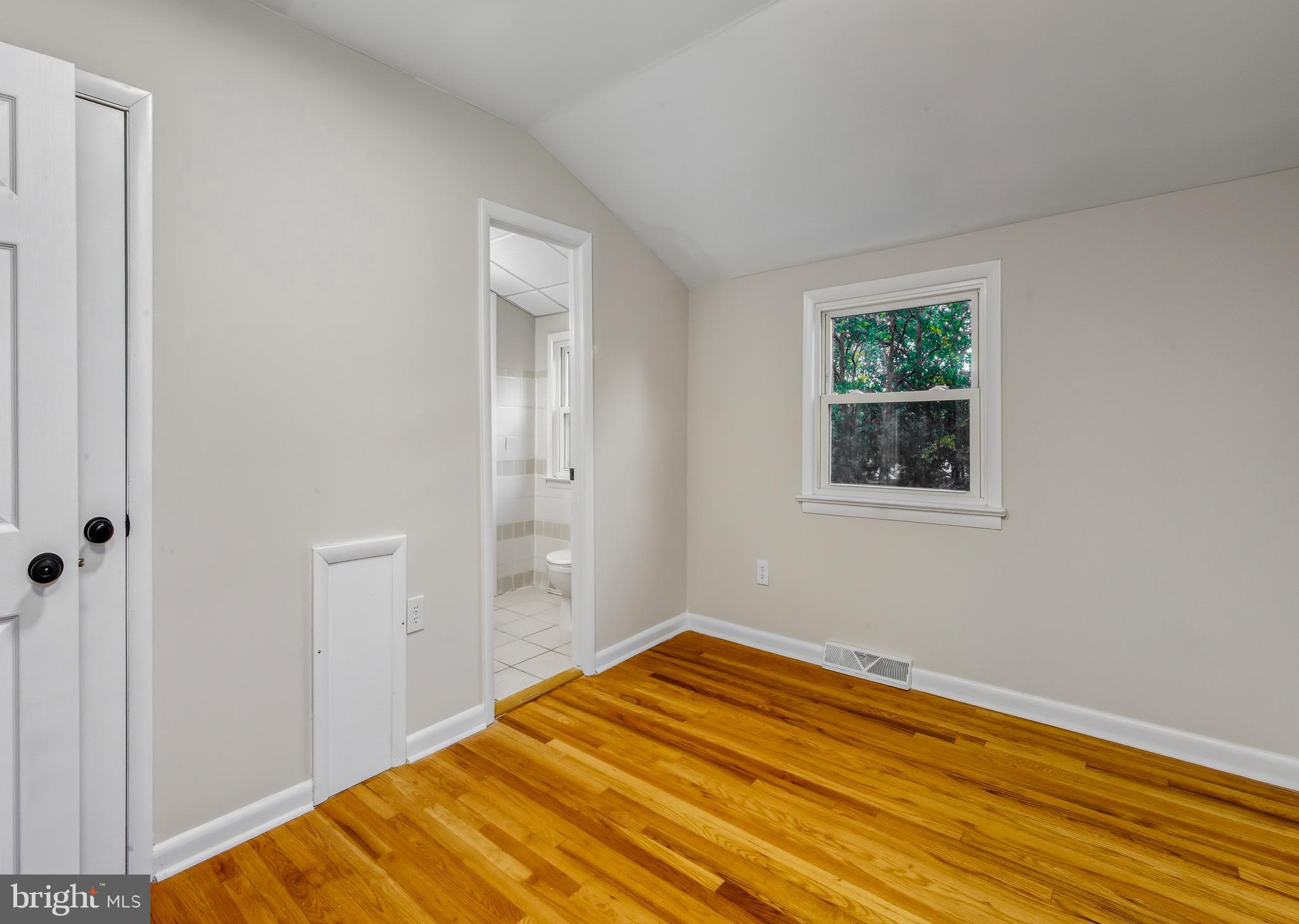 300 Turnersville Road Pine Hill, NJ 08021 - Photo 13 of 22 a bedroom with a bed and a window