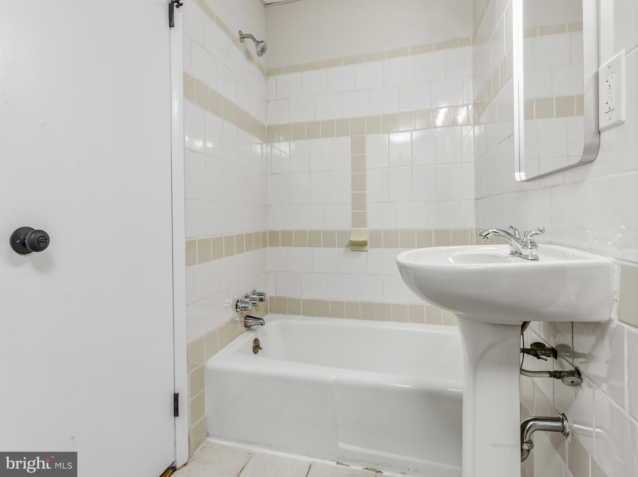 300 Turnersville Road Pine Hill, NJ 08021 - Photo 16 of 22 a bathroom with a bathtub and a sink