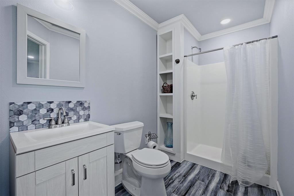 1861-1 Roland Road Whitesboro, TX 76273 - Photo 23 of 39 Bathroom with an over-sized walk-in shower.