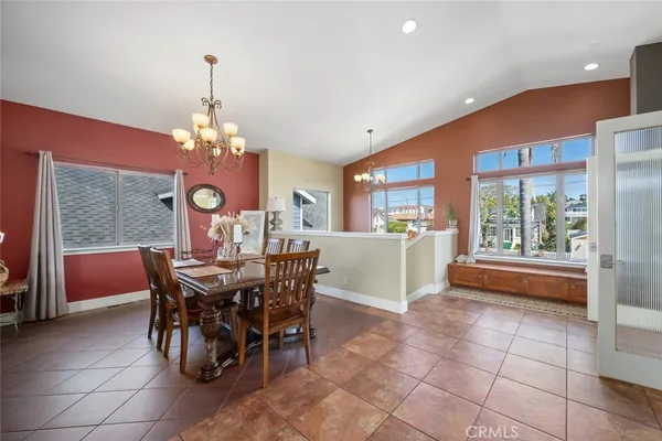 a view of a living room and entryway