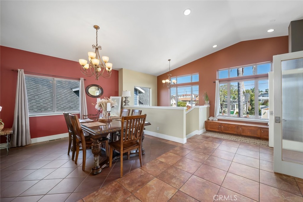 159 Ash Avenue Cayucos, CA 93430 - Photo 17 of 44 a view of a dining room with furniture and chandelier