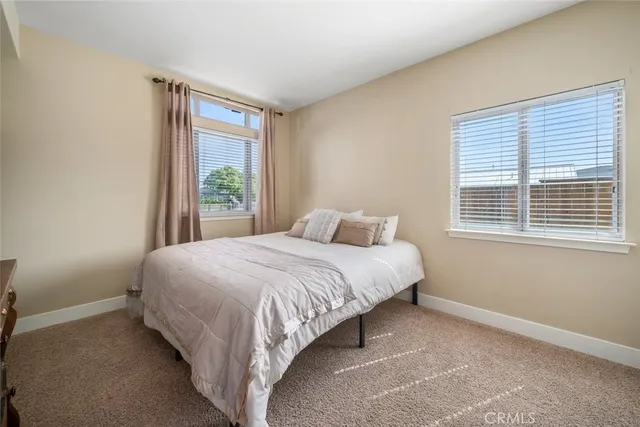 a bedroom with a bed and closet