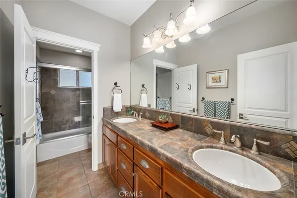 a bathroom with a shower and toilet