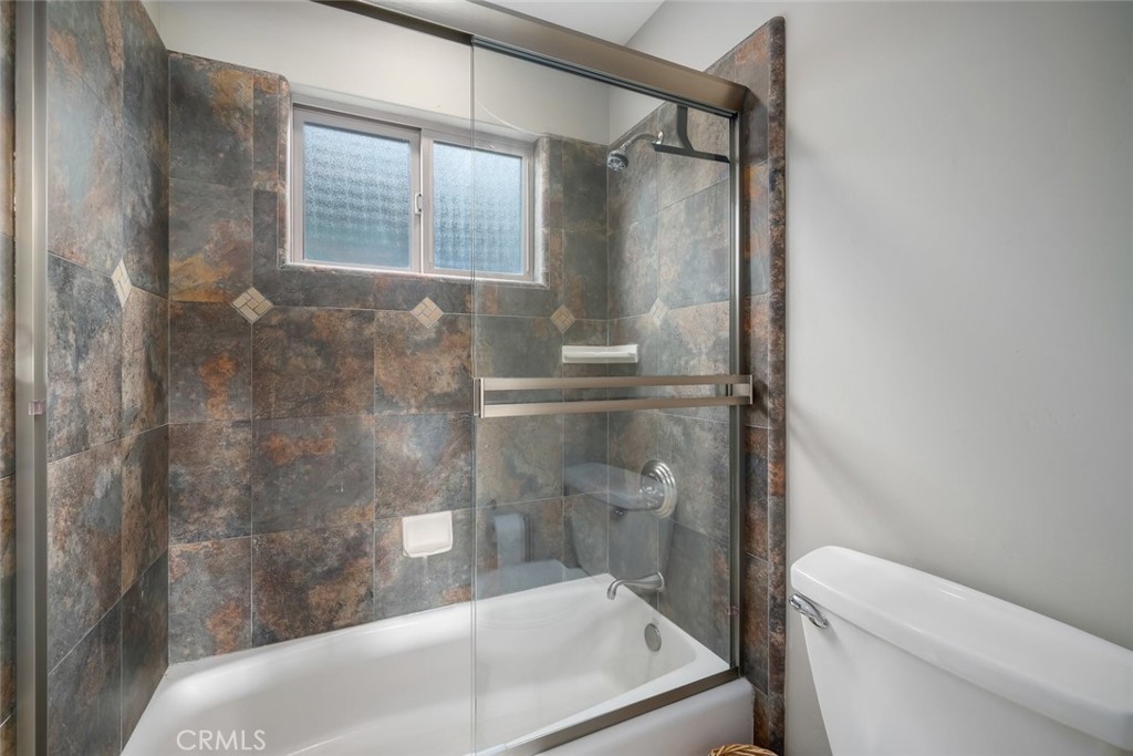 159 Ash Avenue Cayucos, CA 93430 - Photo 29 of 44 a bathroom with a shower and toilet