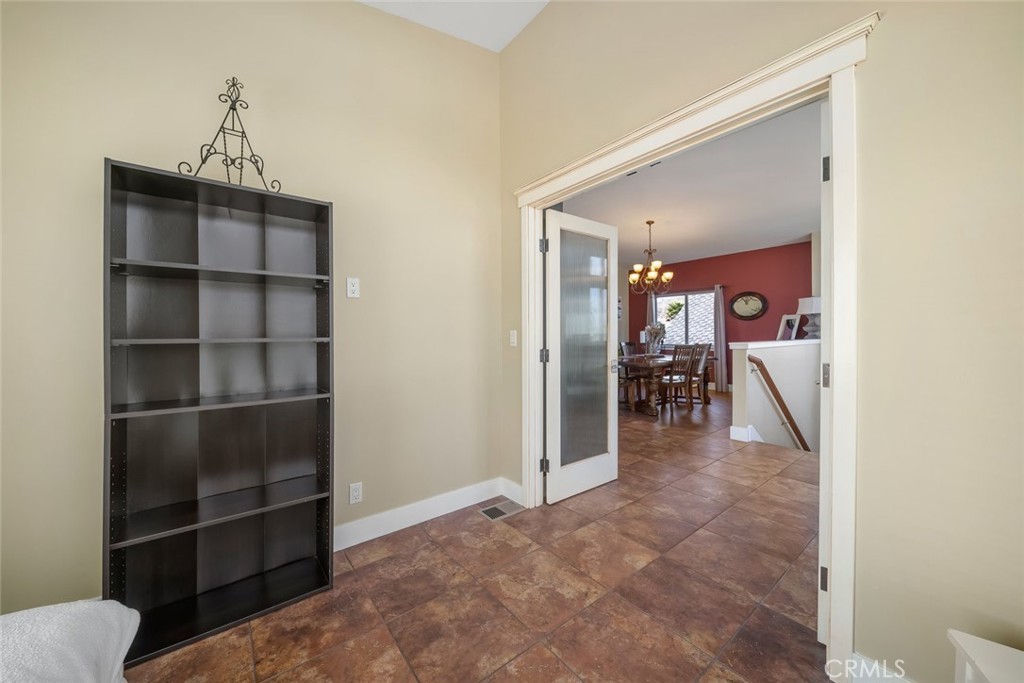 159 Ash Avenue Cayucos, CA 93430 - Photo 35 of 44 a view of a hallway view with wooden floor and a living room