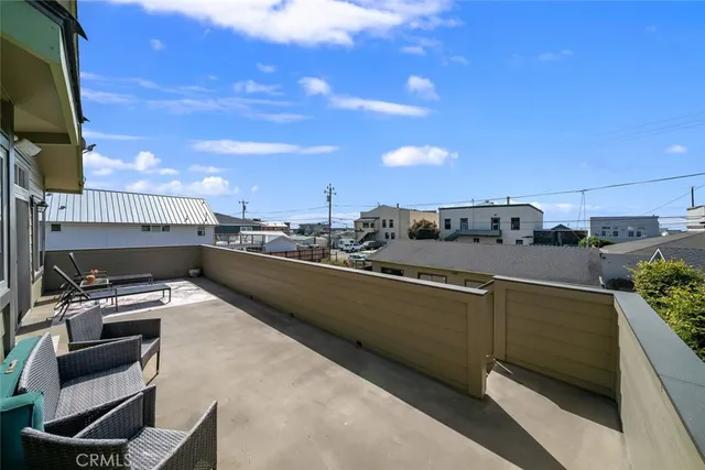 a view of a balcony with an outdoor space