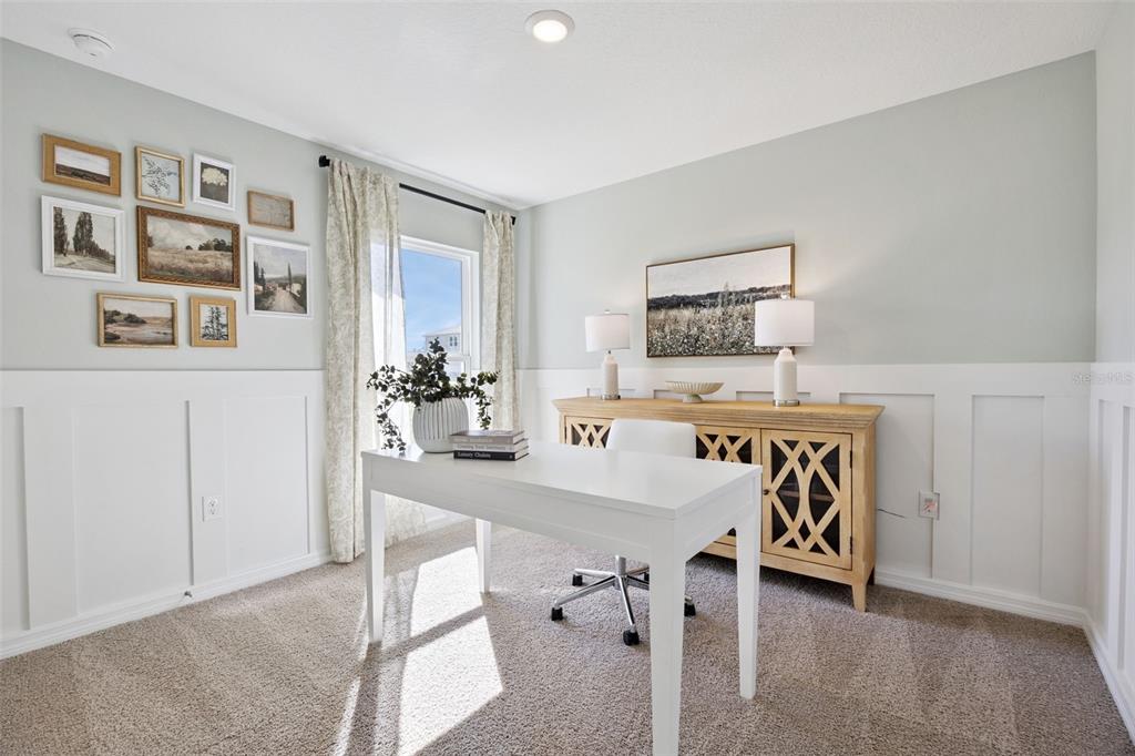 4257 Fennec Fox Way Lakeland, FL 33810 - Photo 23 of 29 a view of a livingroom with furniture and kitchen