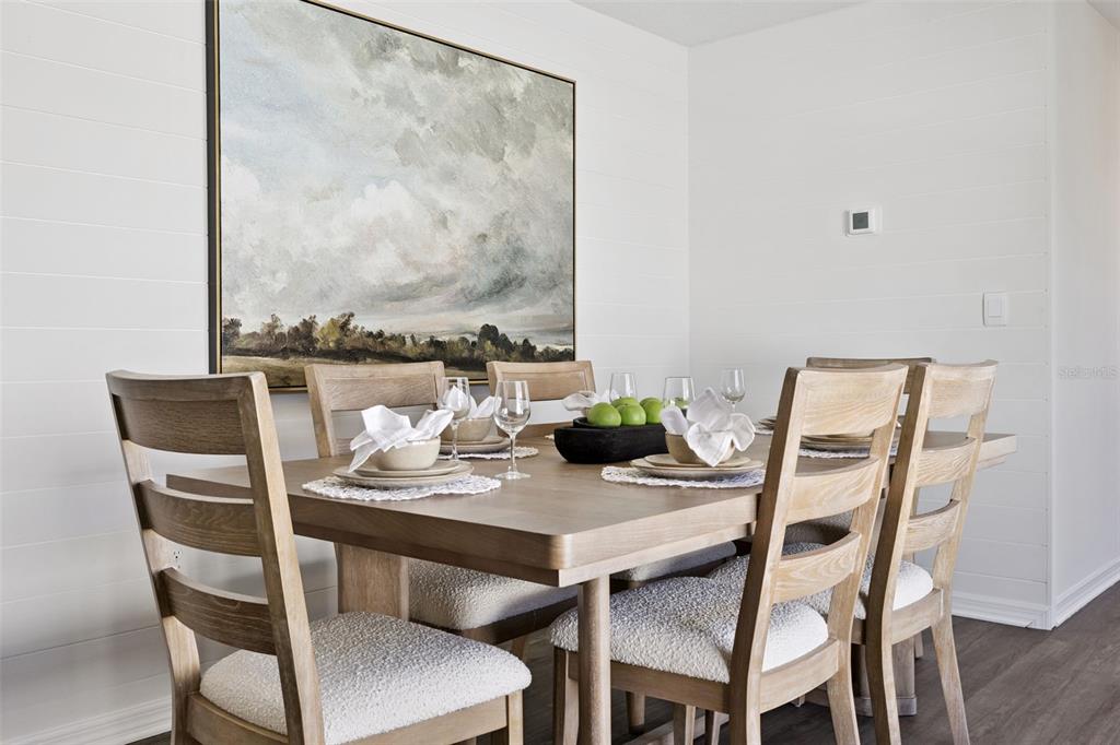 4257 Fennec Fox Way Lakeland, FL 33810 - Photo 5 of 29 a dining room with furniture and window