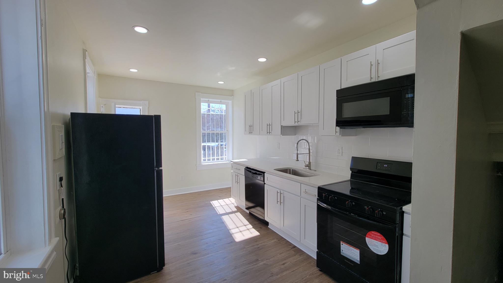 637 South Paca Street, Unit B Baltimore, MD 21230 - Photo 4 of 5 Bright and modern kitchen with sleek finishes.