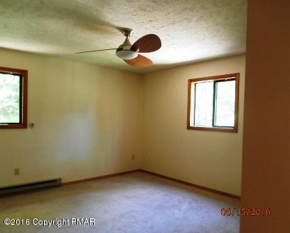 138 Inverhouse Road Henryville, PA 18332 - Photo 3 of 11 an empty room with a window