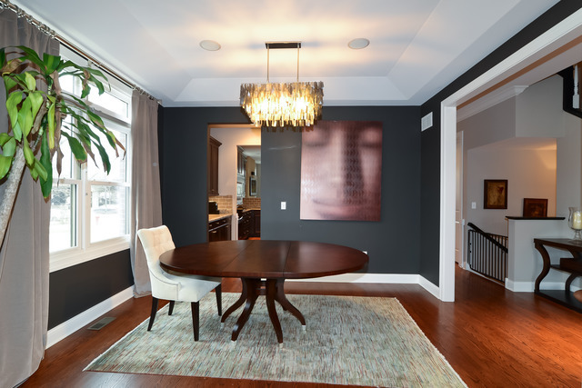 1401 South Emerald Avenue Chicago, IL 60607 - Photo 4 of 12 a view of a dining room with furniture a chandelier and wooden floor