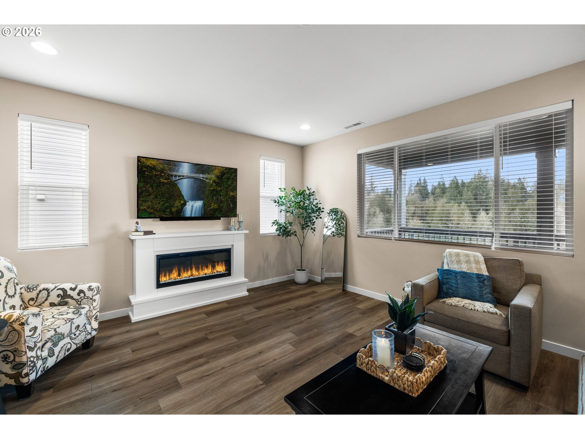 2081 Northeast Ridge Run Lane Estacada, OR 97023 - Photo 11 of 46 a living room with furniture fireplace and flat screen tv