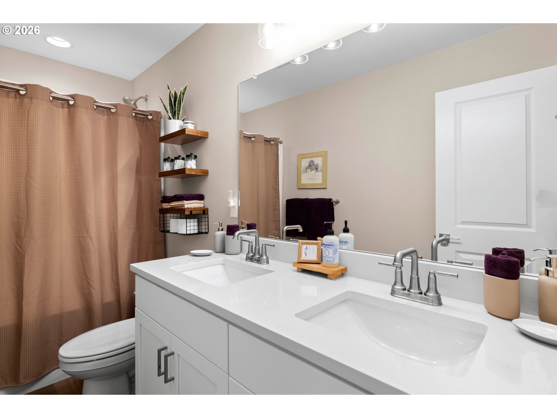 2081 Northeast Ridge Run Lane Estacada, OR 97023 - Photo 23 of 46 a bathroom with a sink a toilet and shower curtain