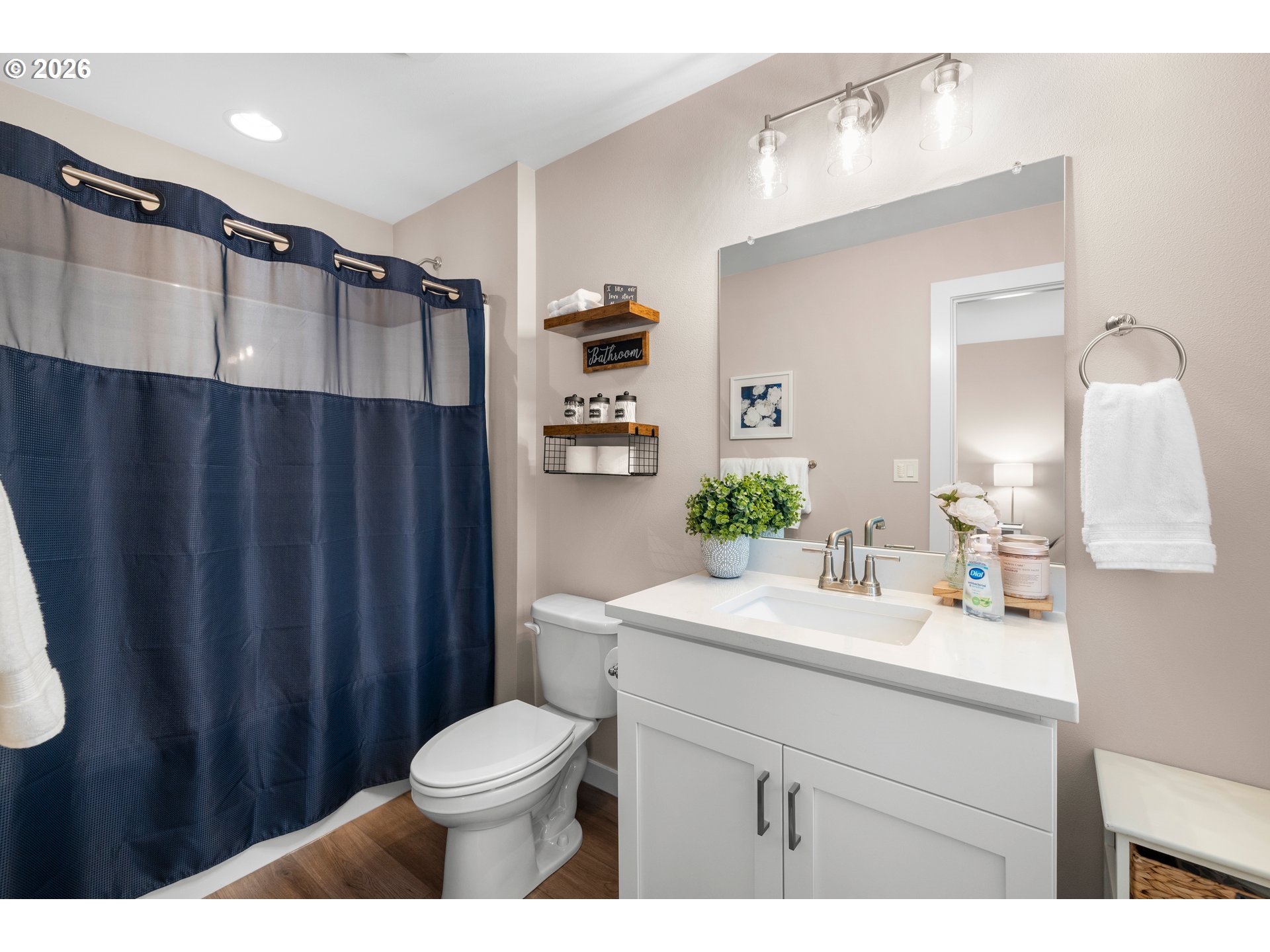 2081 Northeast Ridge Run Lane Estacada, OR 97023 - Photo 34 of 46 a bathroom with a sink a toilet a shower and a mirror