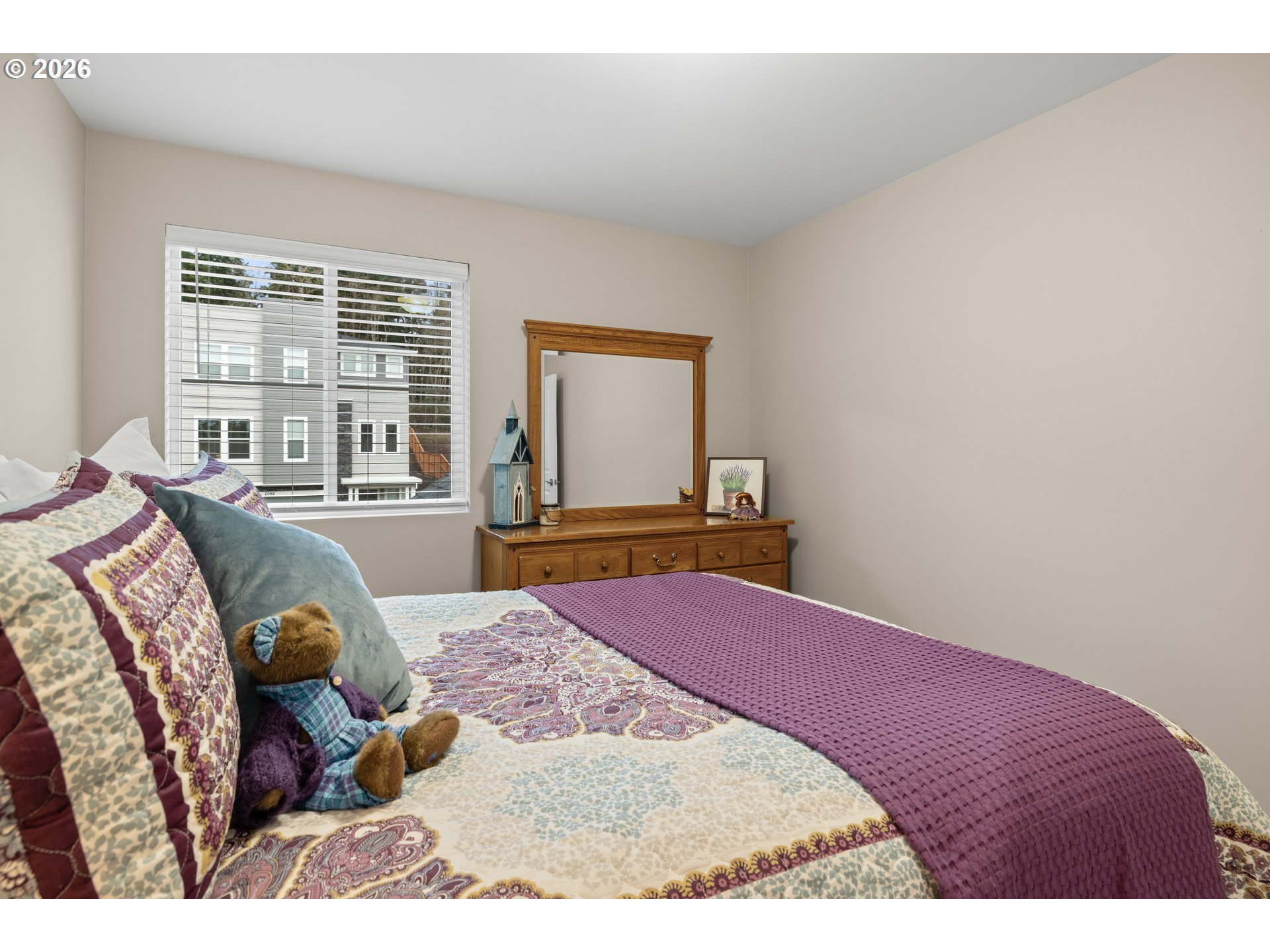 2081 Northeast Ridge Run Lane Estacada, OR 97023 - Photo 39 of 46 a bedroom with a bed and wooden floor