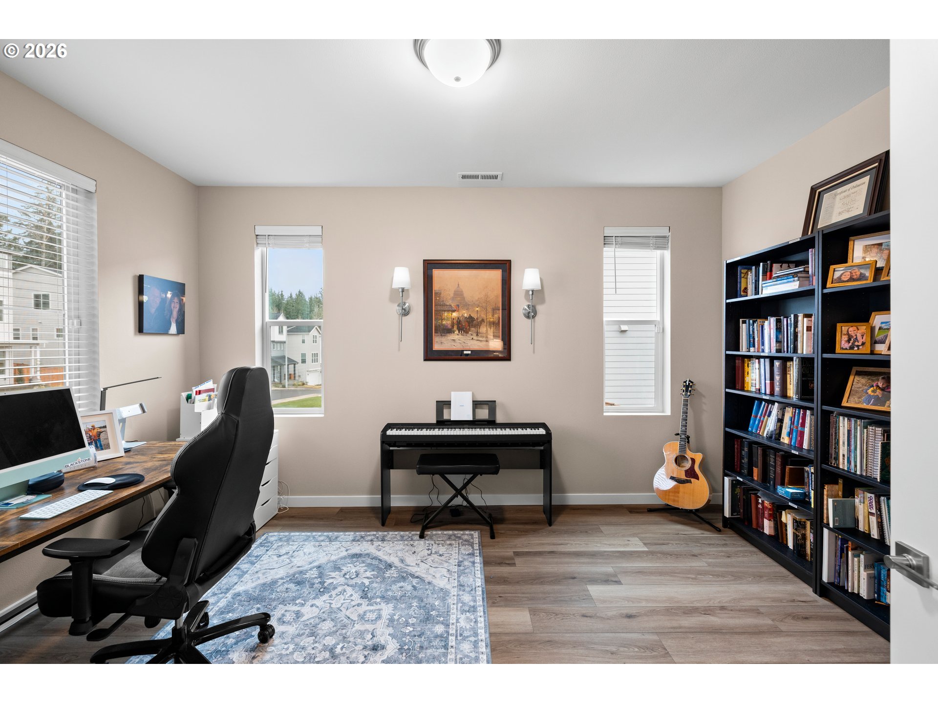 2081 Northeast Ridge Run Lane Estacada, OR 97023 - Photo 6 of 46 a living room with furniture and a book shelf