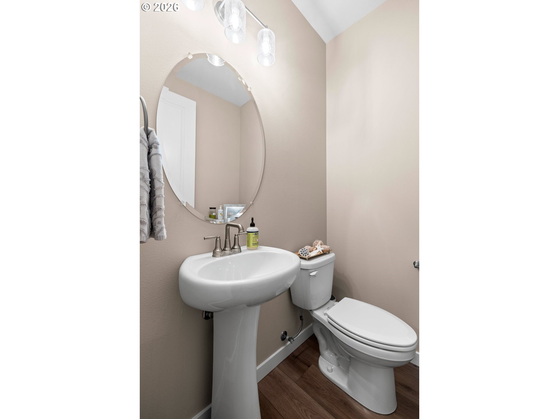 2081 Northeast Ridge Run Lane Estacada, OR 97023 - Photo 8 of 46 a bathroom with a toilet sink and mirror