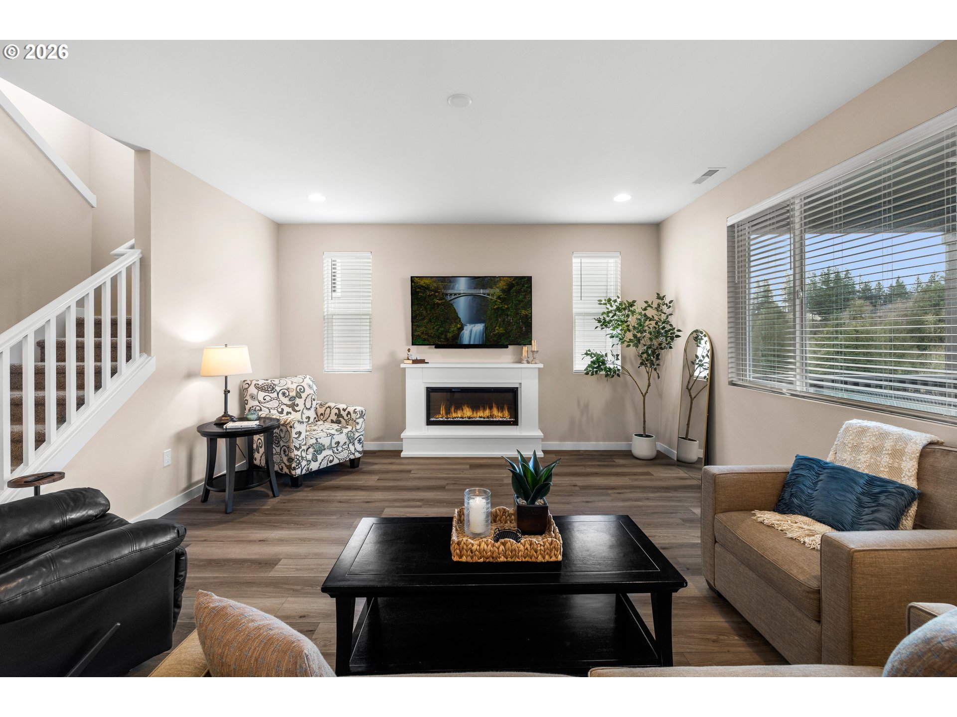 2081 Northeast Ridge Run Lane Estacada, OR 97023 - Photo 10 of 46 a living room with furniture and a flat screen tv