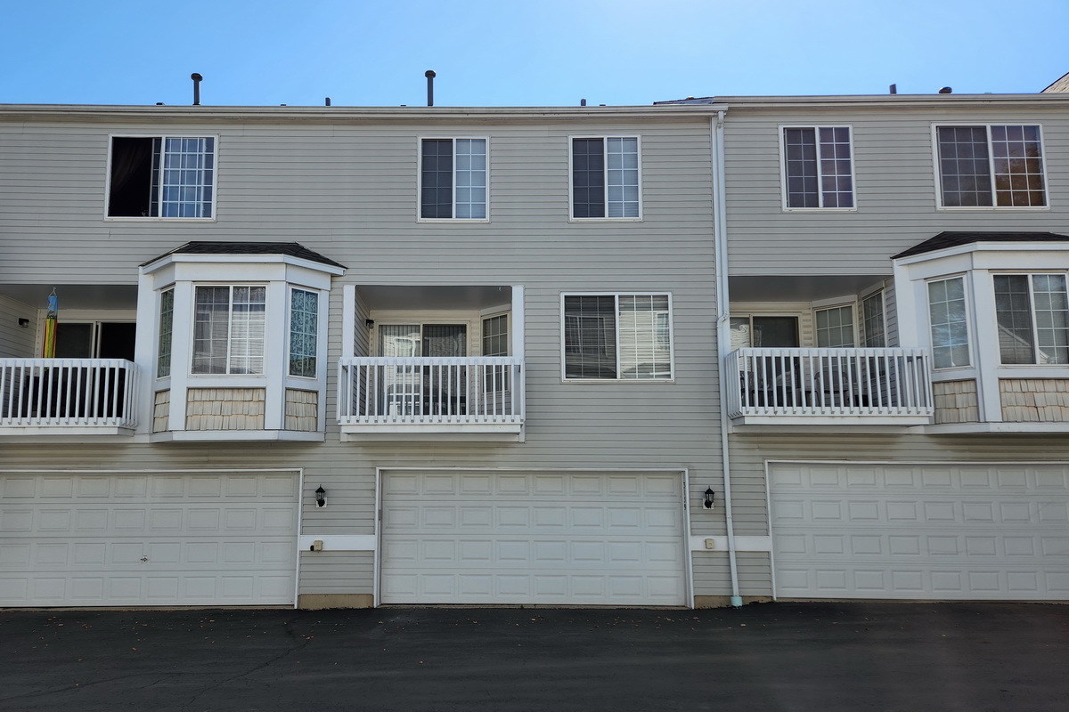 3159 Cambria Court Aurora, IL 60503 - Photo 20 of 20 a front view of a house with a yard