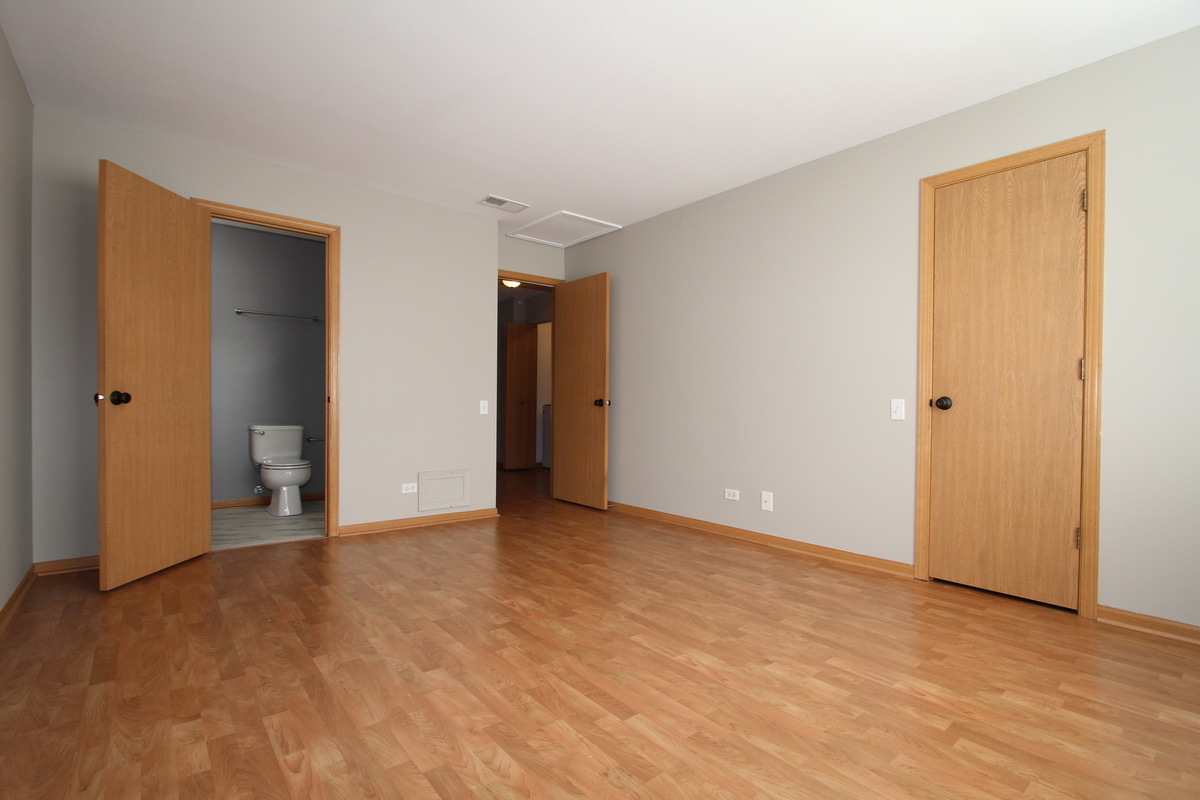 3159 Cambria Court Aurora, IL 60503 - Photo 10 of 20 a view of an empty room with closet and a window