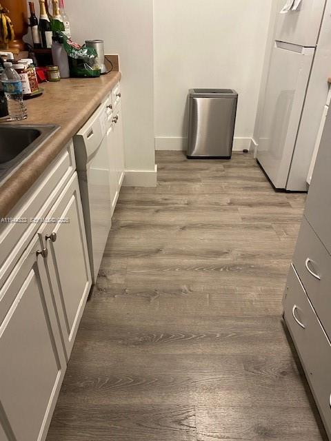 17145 North Bay Road, Unit 4312 Sunny Isles Beach, FL 33160 - Photo 2 of 33 a view of room with wooden floor and staircase