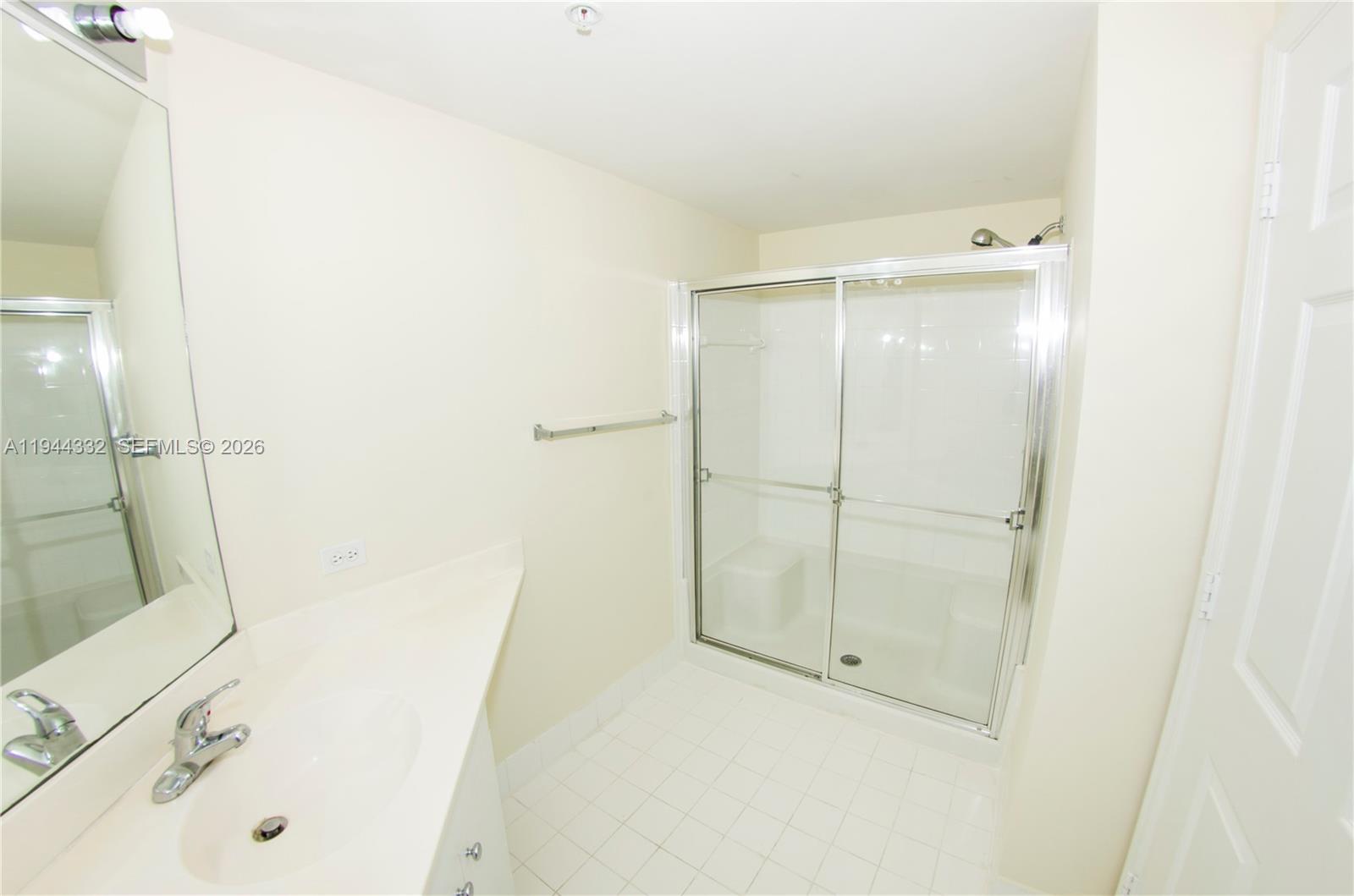 17145 North Bay Road, Unit 4312 Sunny Isles Beach, FL 33160 - Photo 3 of 33 a bathroom with a bathtub and a shower