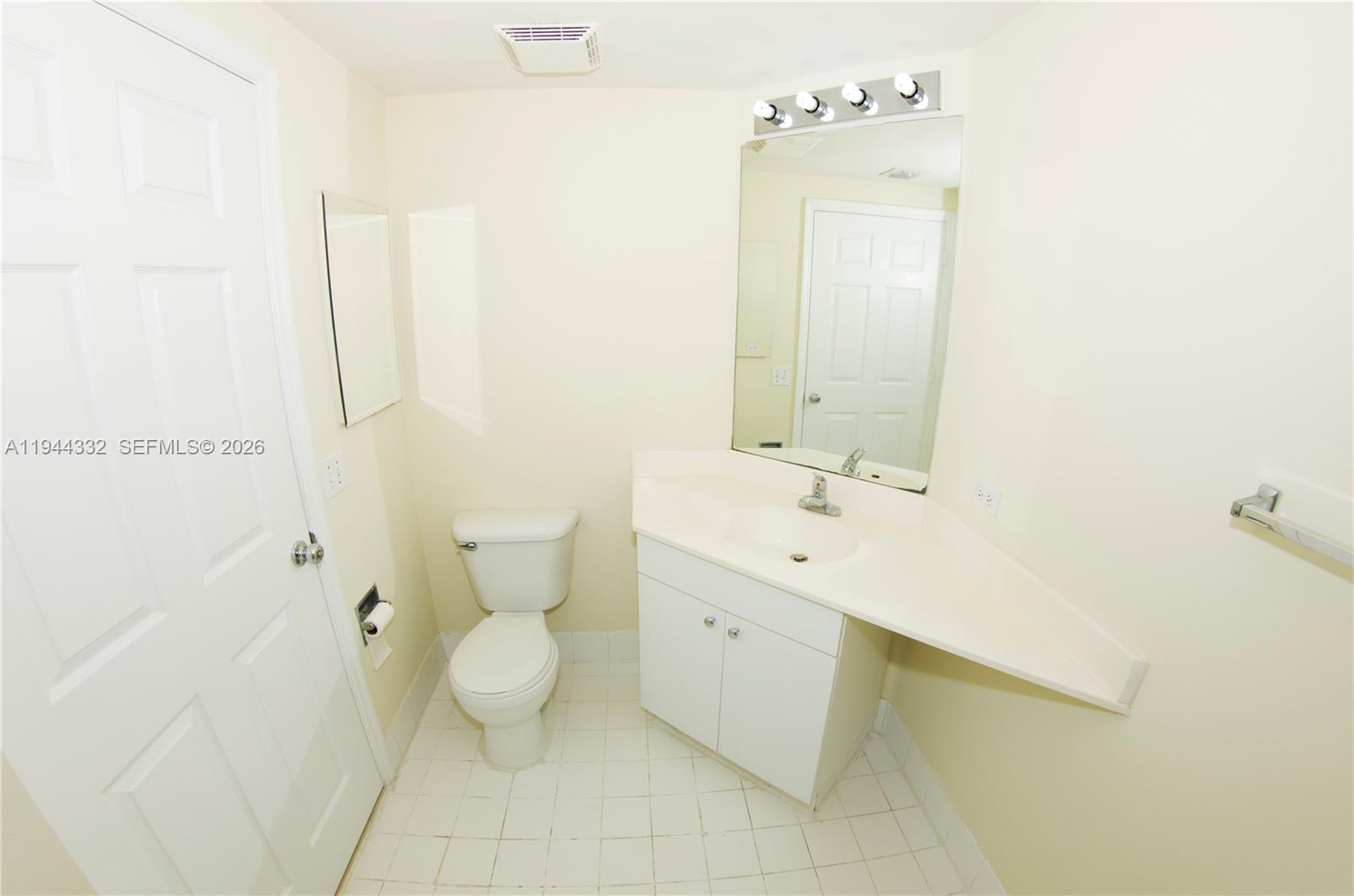 17145 North Bay Road, Unit 4312 Sunny Isles Beach, FL 33160 - Photo 4 of 33 a bathroom with a sink a toilet and shower