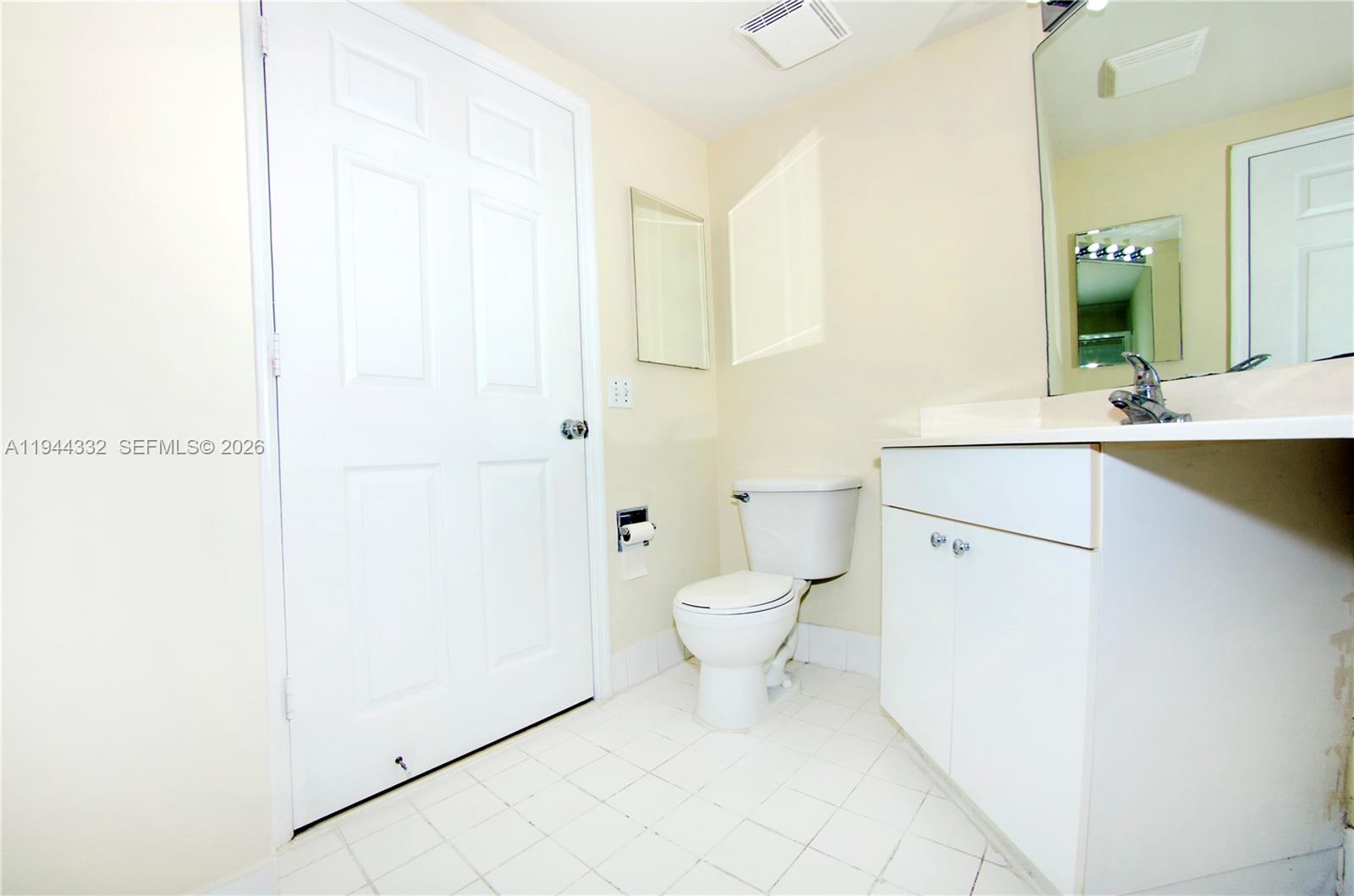 17145 North Bay Road, Unit 4312 Sunny Isles Beach, FL 33160 - Photo 6 of 33 a bathroom with a sink a toilet and shower