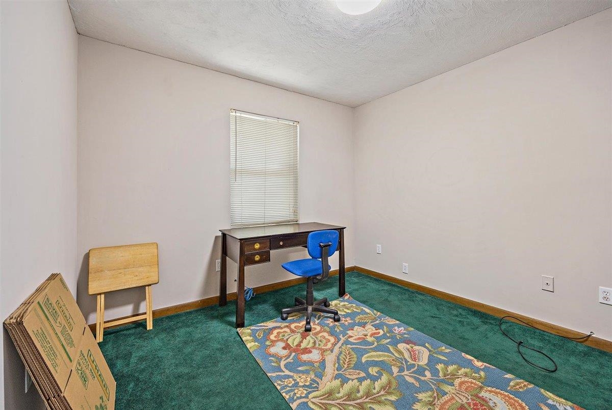 120 Pompano Road St. Augustine, FL 32086 - Photo 9 of 18 a room with furniture and a rug
