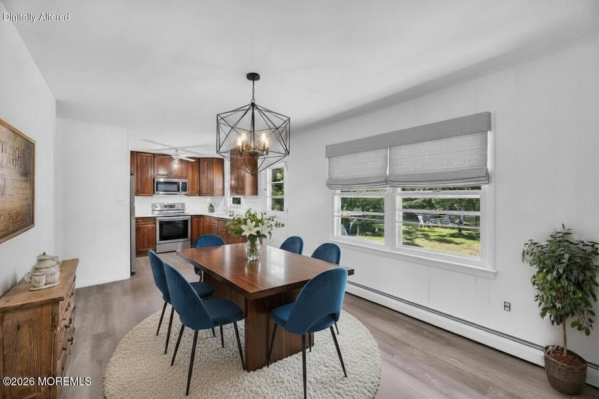 416 Oak Tree Road Freehold, NJ 07728 - Photo 4 of 46 a view of a dining room with furniture window and outside view