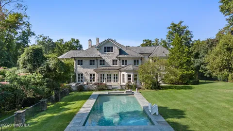 a view of a house with a swimming pool