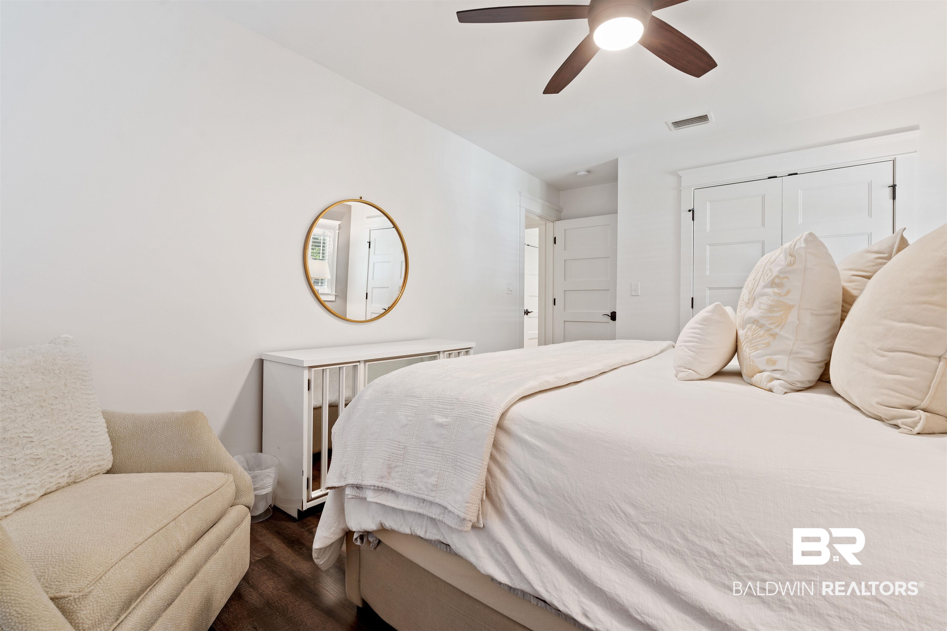 3808 Claridge Road North Mobile, AL 36608 - Photo 27 of 43 Bedroom with dark wood-type flooring, ceiling fan, and a closet