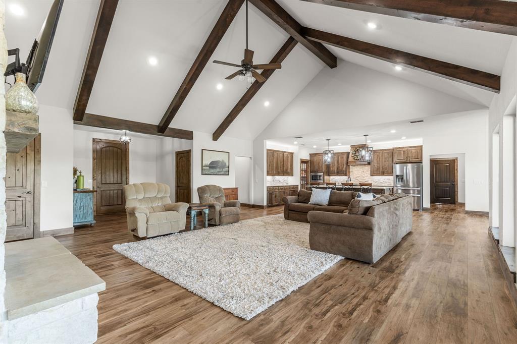 515 Sales Road Windthorst, TX 76389 - Photo 7 of 34 a living room with furniture and a wooden floor