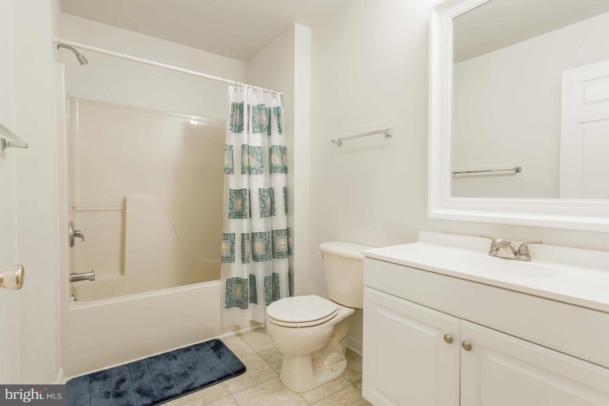 24174 Zoar Road Georgetown, DE 19947 - Photo 20 of 32 UPDATED HALL BATHROOM