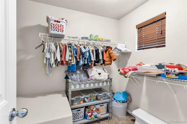 a very nice looking room with a book shelf