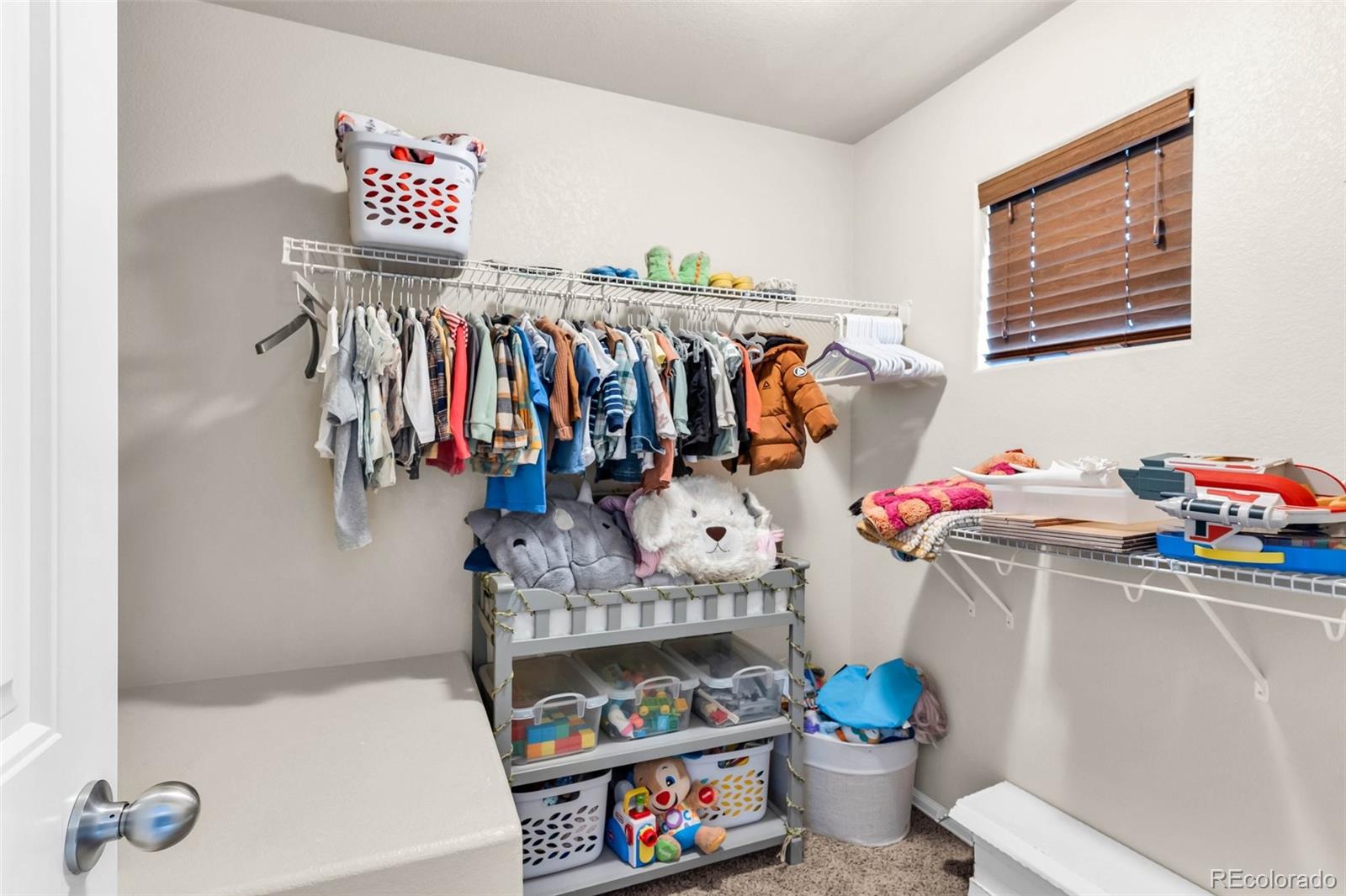 2108 O'Neal Circle Pueblo, CO 81004 - Photo 17 of 39 a very nice looking room with a book shelf