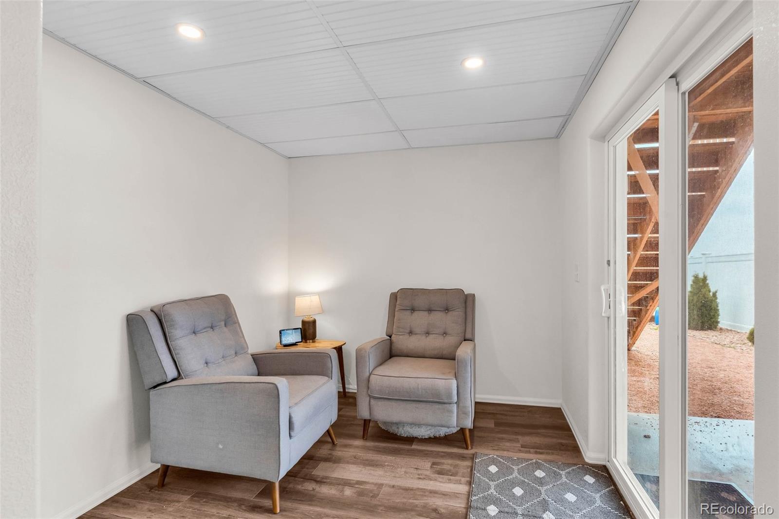 2108 O'Neal Circle Pueblo, CO 81004 - Photo 25 of 39 a living room with furniture and a window