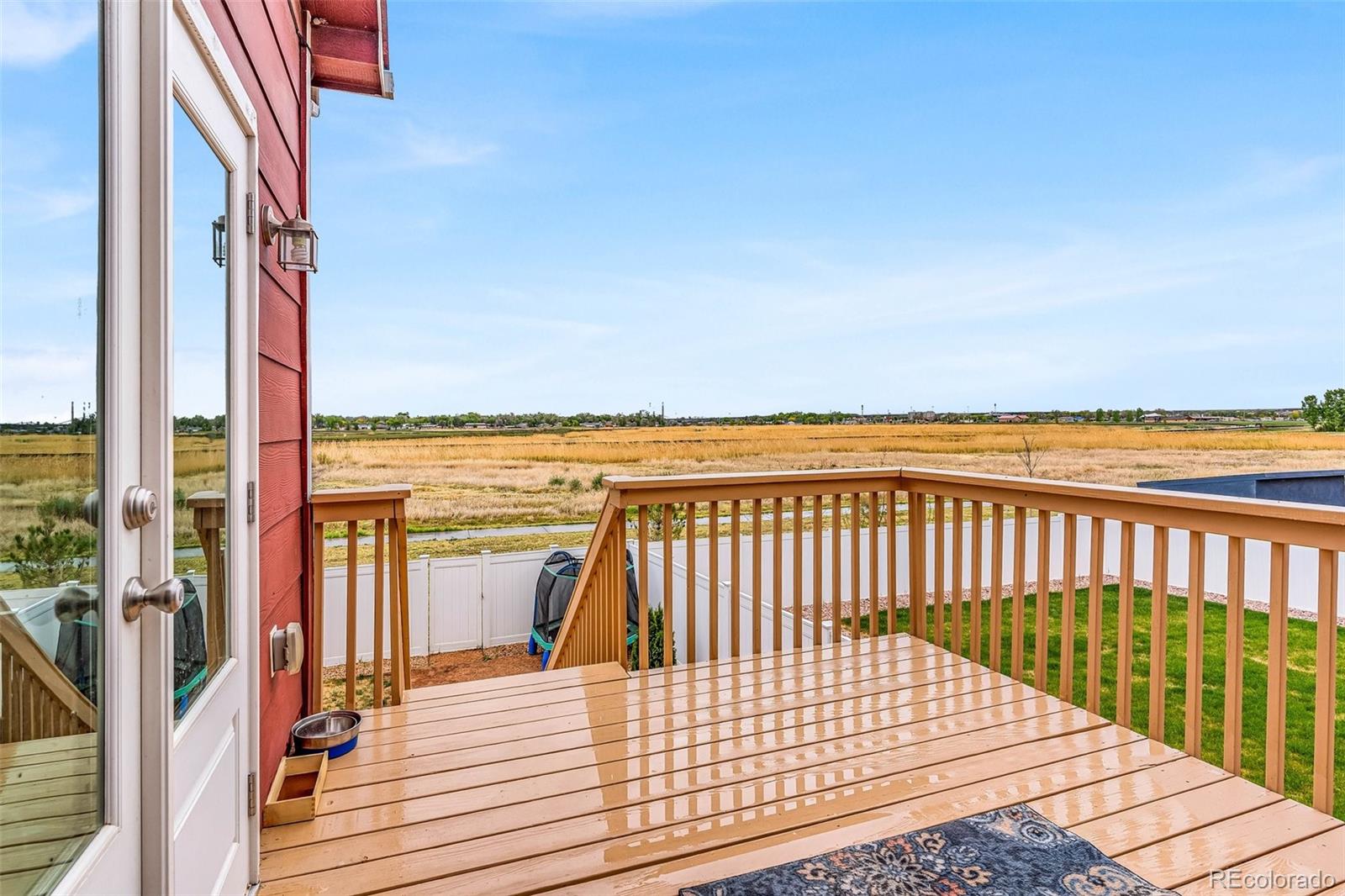2108 O'Neal Circle Pueblo, CO 81004 - Photo 27 of 39 a view of balcony with wooden floor