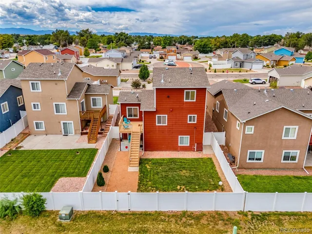 a view of a house with a swimming pool