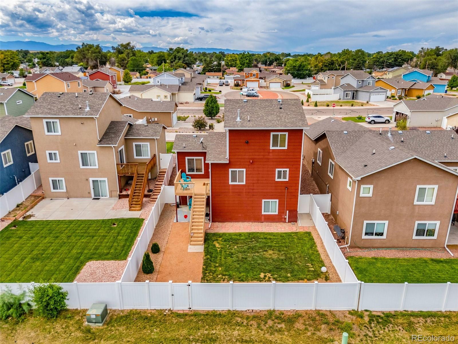 2108 O'Neal Circle Pueblo, CO 81004 - Photo 32 of 39 a view of a house with a swimming pool