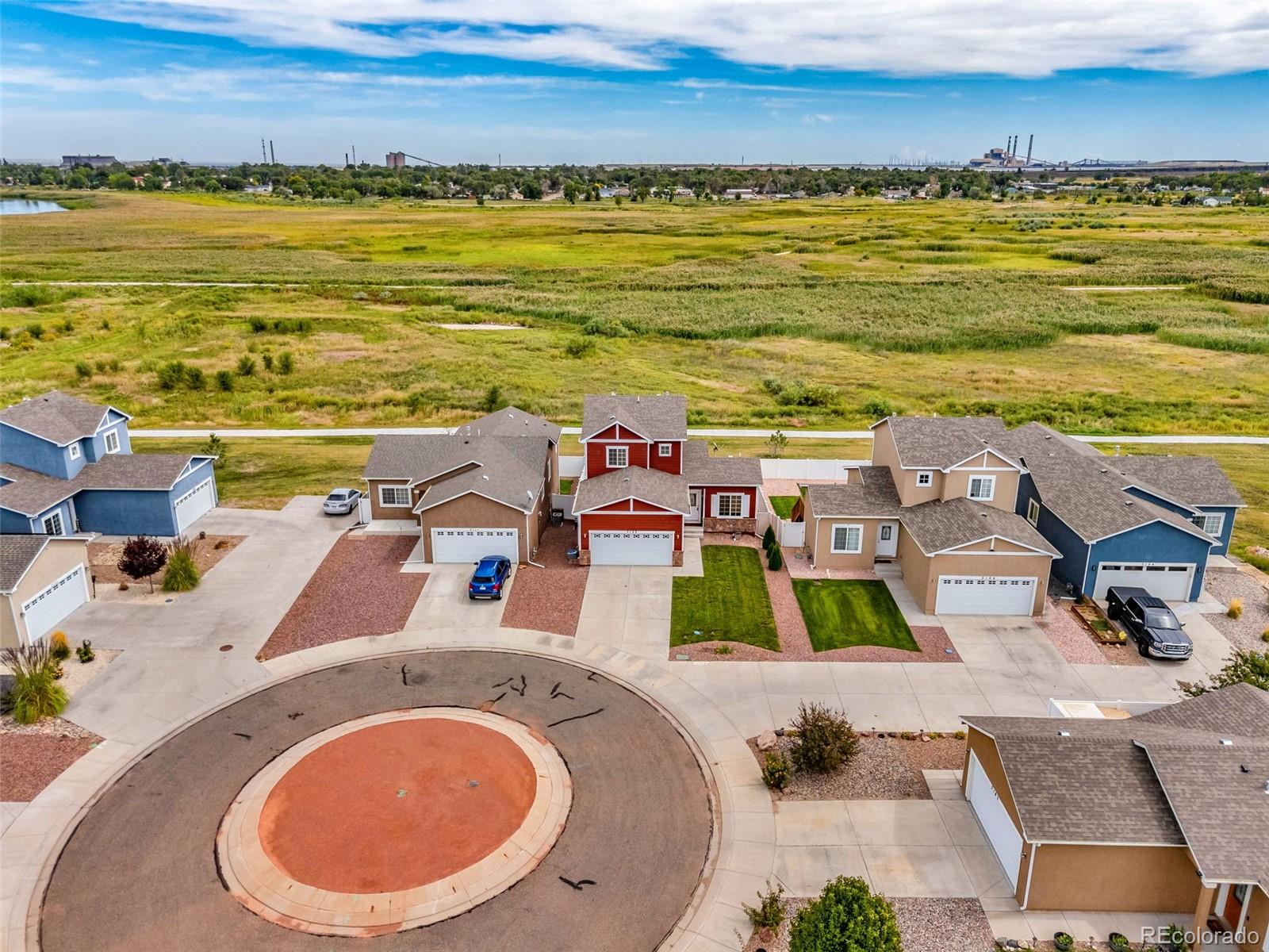 2108 O'Neal Circle Pueblo, CO 81004 - Photo 33 of 39 a view of a ocean with beach and ocean view