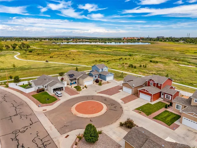 a view of a swimming pool with an ocean view