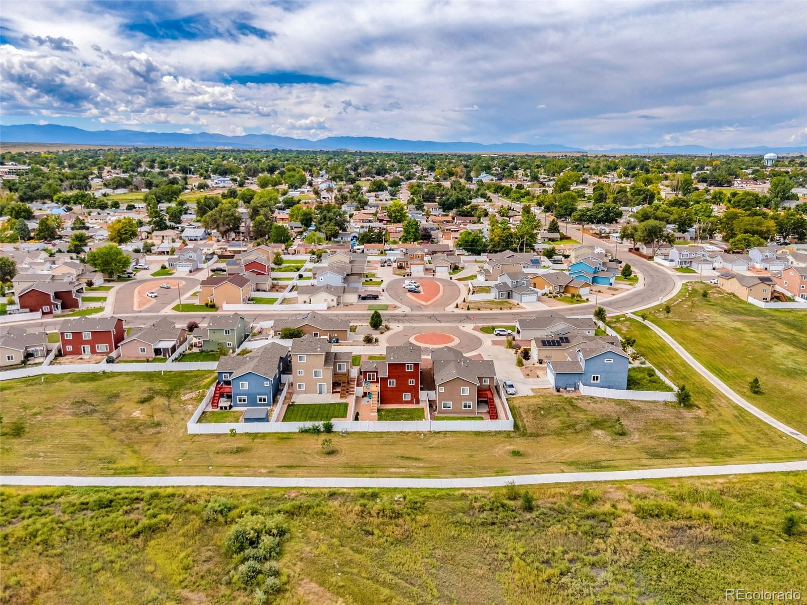 2108 O'Neal Circle Pueblo, CO 81004 - Photo 38 of 39 a view of a swimming pool with an ocean view