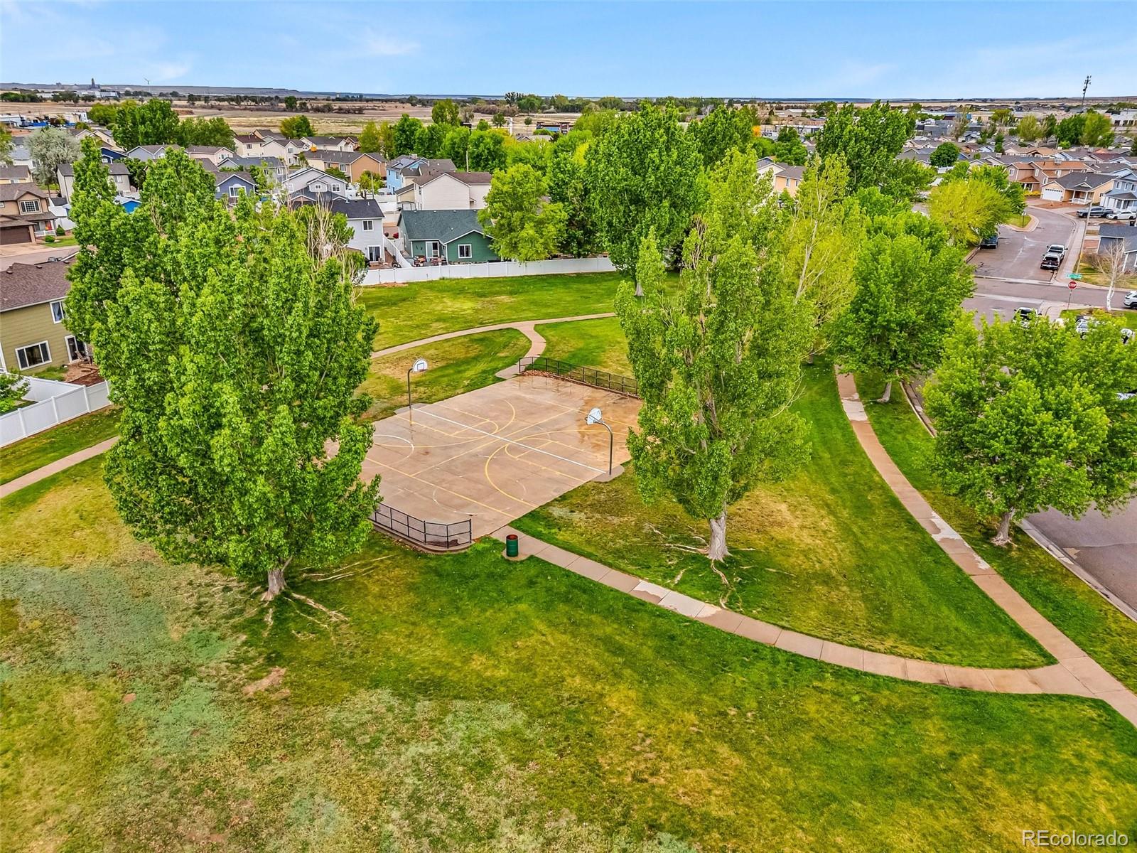 2108 O'Neal Circle Pueblo, CO 81004 - Photo 39 of 39 a view of a swimming pool with a yard